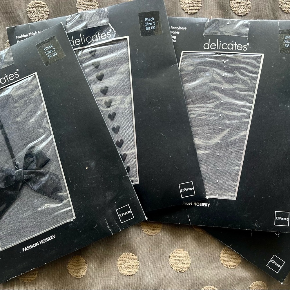 4 pairs of Hosiery, 1 pair of thigh highs (bow), 3 pairs of pantyhose